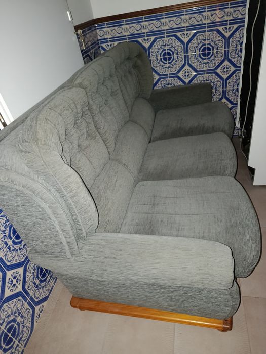 Sofá cama de três lugares