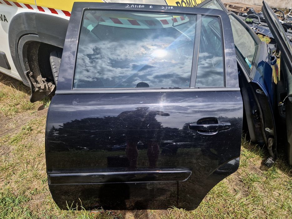 Drzwi lewe tył Zafira B lakier Z20R