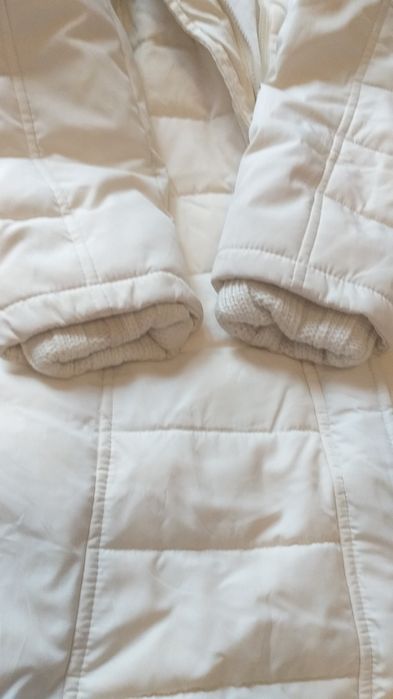 Женский пуховик .