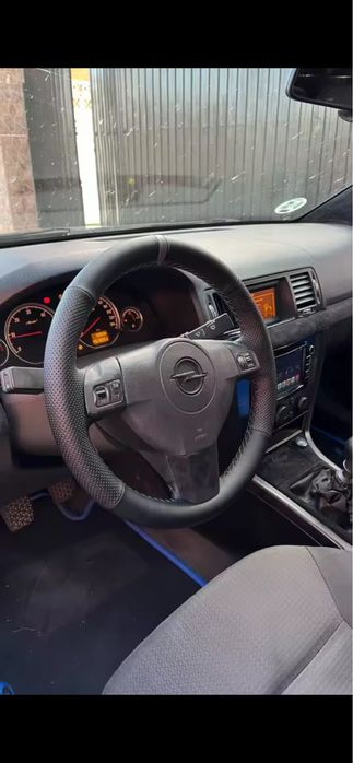 Capa cozer volante opel astra h