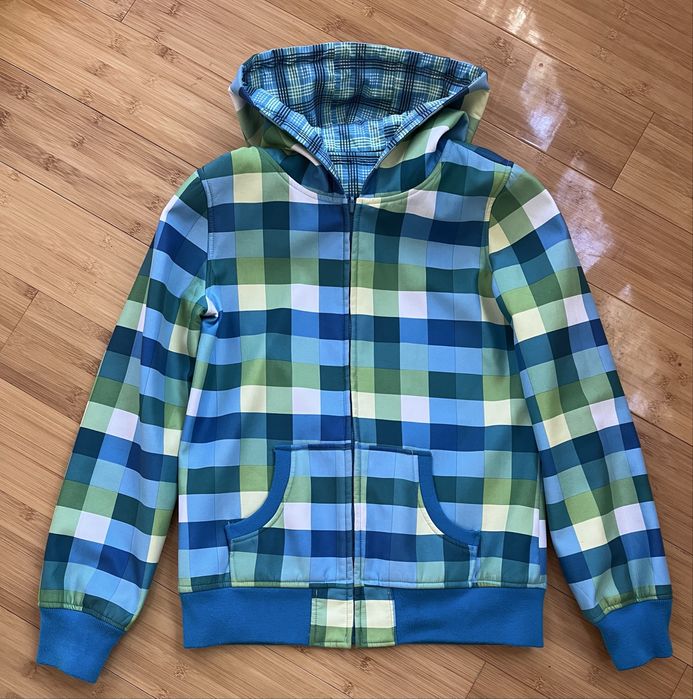 Куртка вітровка двостороння з капюшоном в клітинку