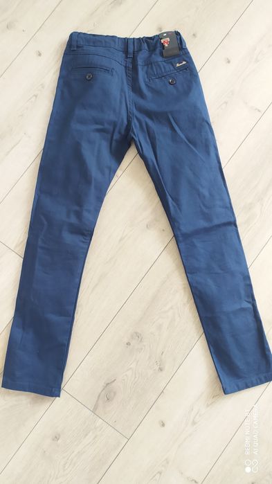 Штани   сині   .
