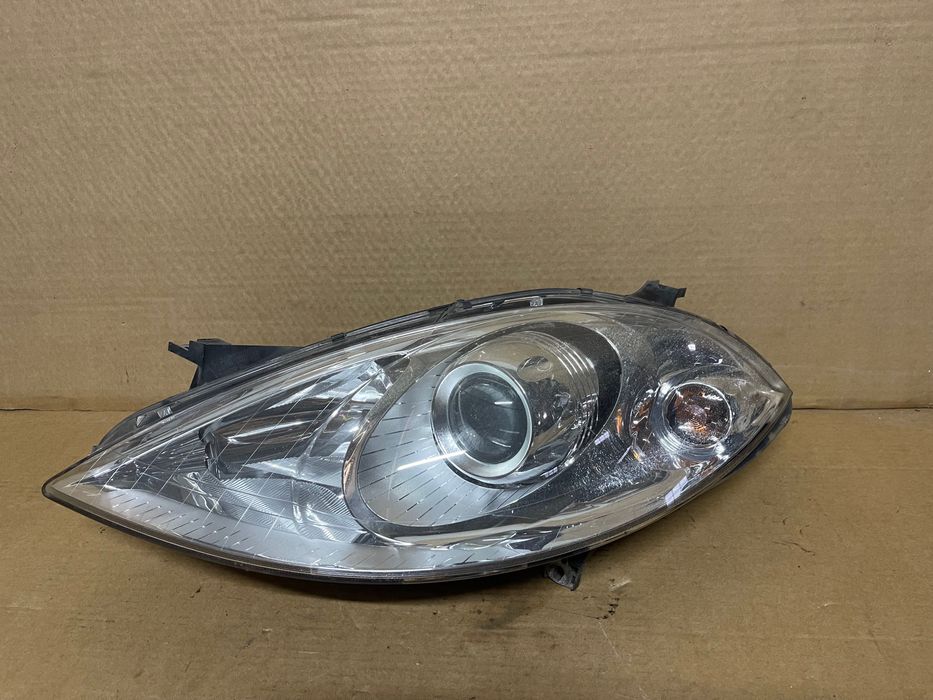 FAROL OPTICA ESQUERDA MERCEDES W169 A160 A180 A200