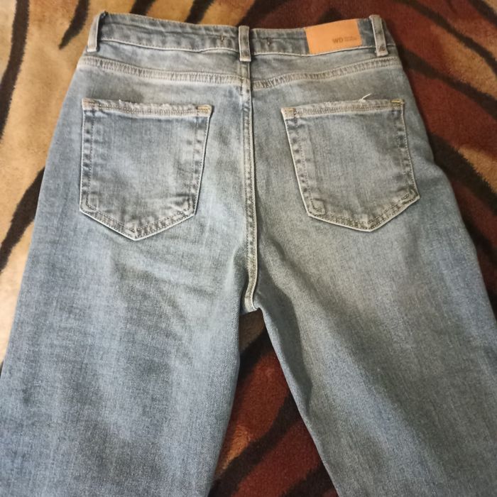 Нові світлі Джинси кльош стрейчеві з ефектом утяжки Boot cut розмір 36 С блакитні небесний колір