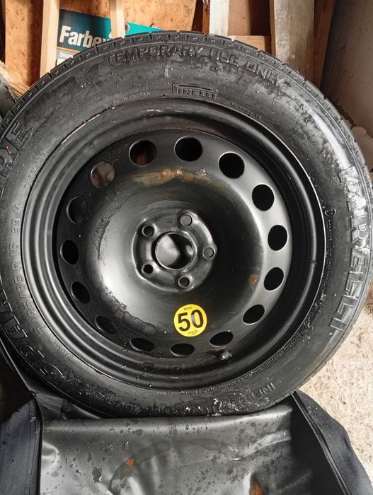 Докатка запаска на легковий автомобіль