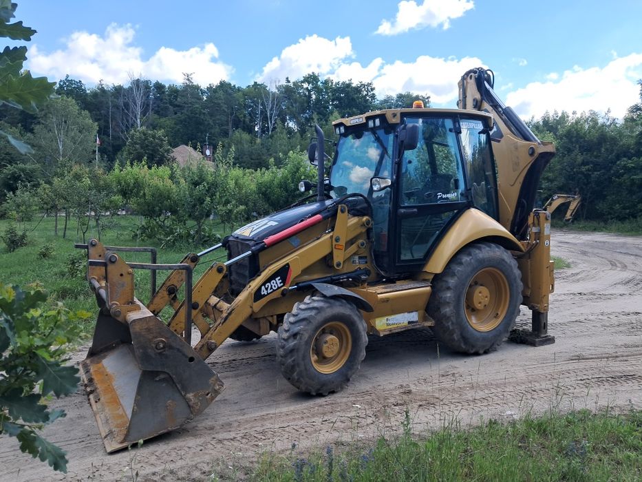 Koparko ładowarka cat 428 e