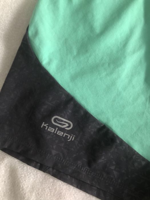Szaro-zielone spodenki szorty sportowe kalenji