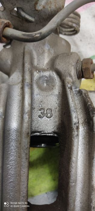 Zacisk hamulcowy lewy prawy tył Golf 5 Leon Altea Touran Audi a3