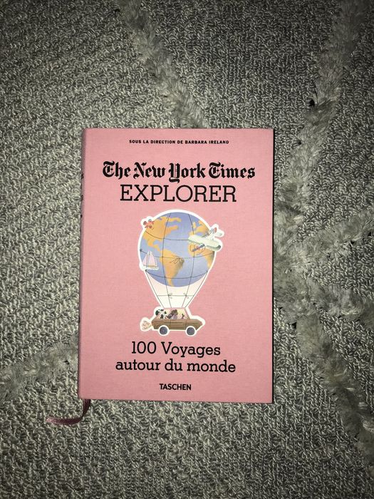 Книга NYT Explorer. 100 Trips Around the World (Французькою мовою)