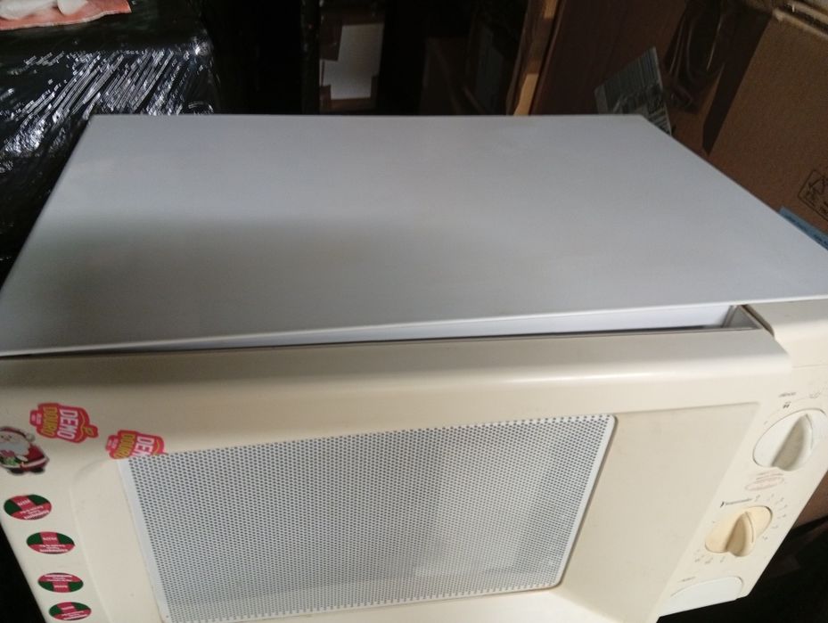 Eletrodomėstico para cozinha em pleno  funcionamento.