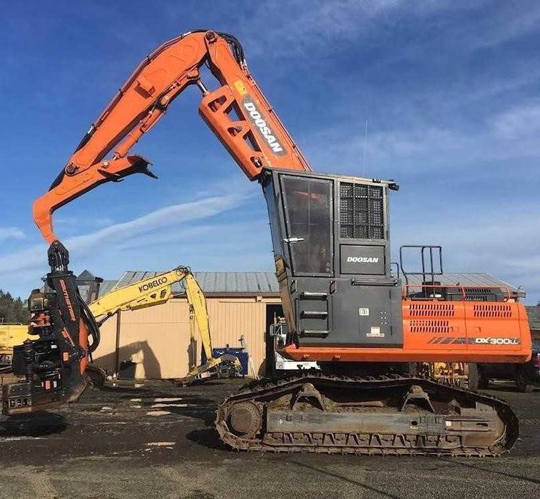 Оренда навантажувач - екскаватор. Послуги спецтехніки