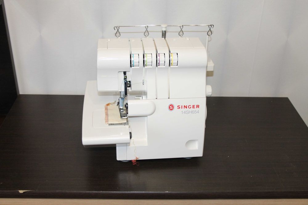 Fabrycznie NOWY Overlock SINGER 14SH654 – 24 miesiące gwarancji