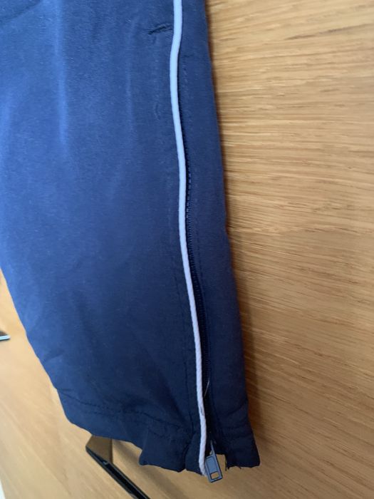 Spodnie z rozpinanymi u dołu nogawkami  7-8 lat