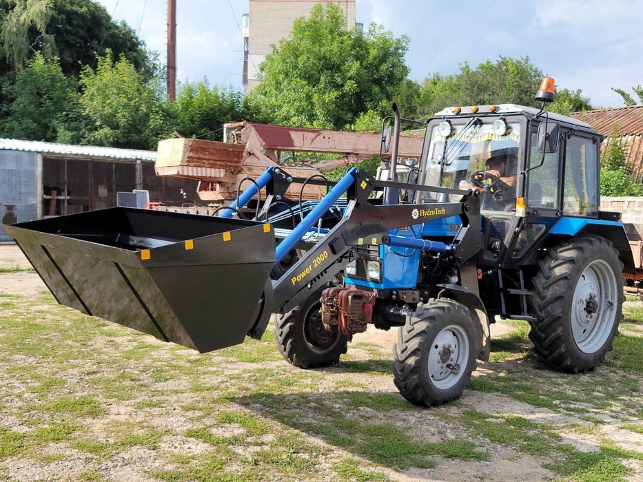 Быстросйомный фронтальный погрузчик кун Юмз