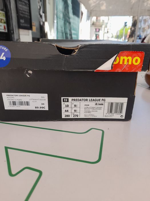 Chuteiras relva sintética