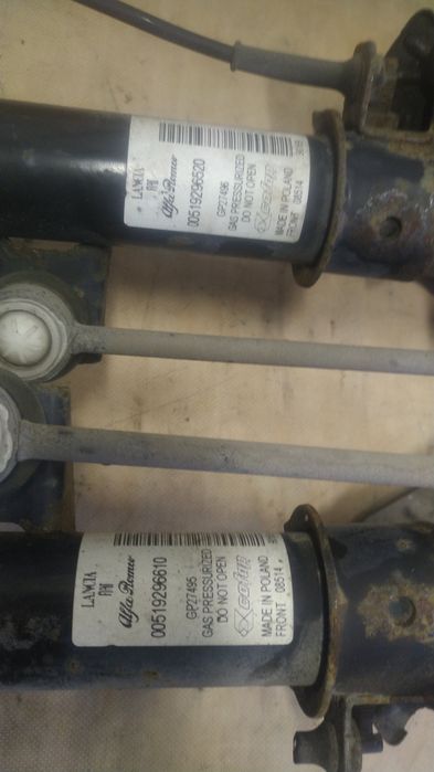 ) Lancia Ypsilon amortyzatory przód prawy lewy piasta zwrotnica