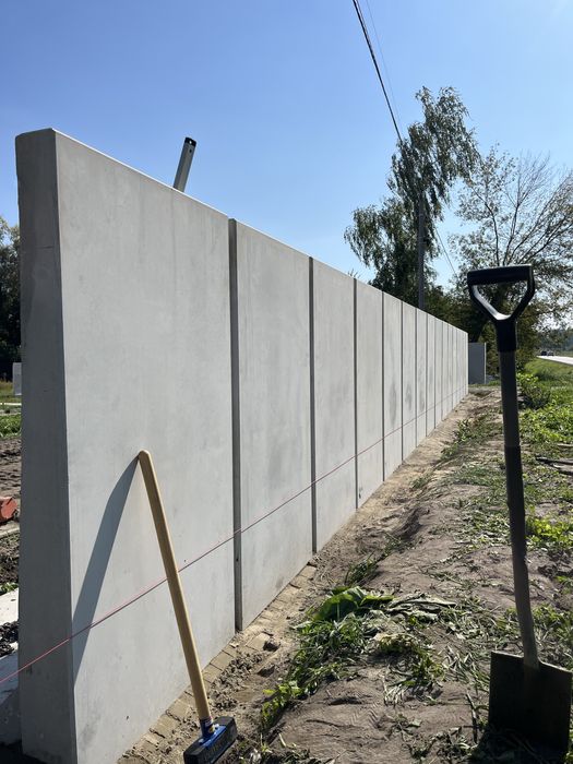 Montaż ogrodzeń betonowych oraz z L’ek oporowych .