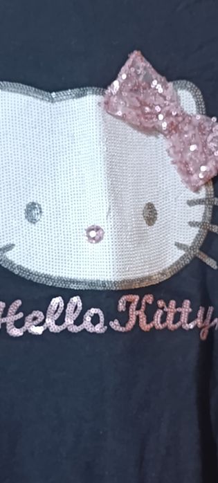 Śliczna sukienka Hello Kity rozm 146 .