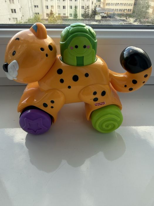 Fisher Prise іграшка каталка