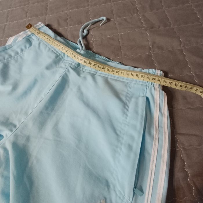 Piękne błękitne spodnie adidas 40