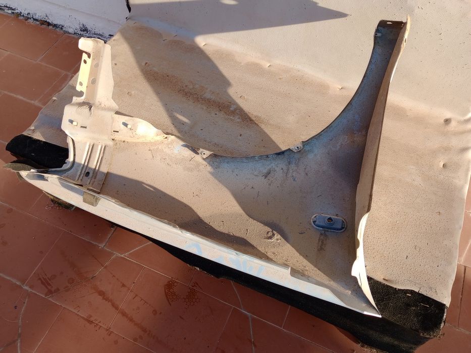 Guarda lamas esquerdo vw polo mpi 6n2