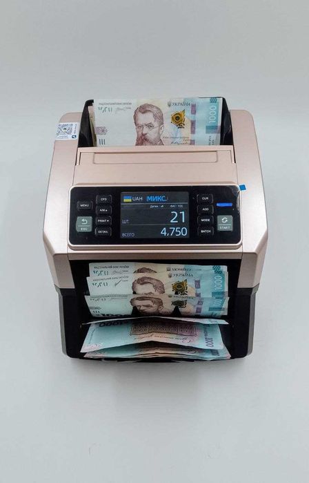 Електронна рахувальна машинка з розпізнаванням номіналів банкнот
