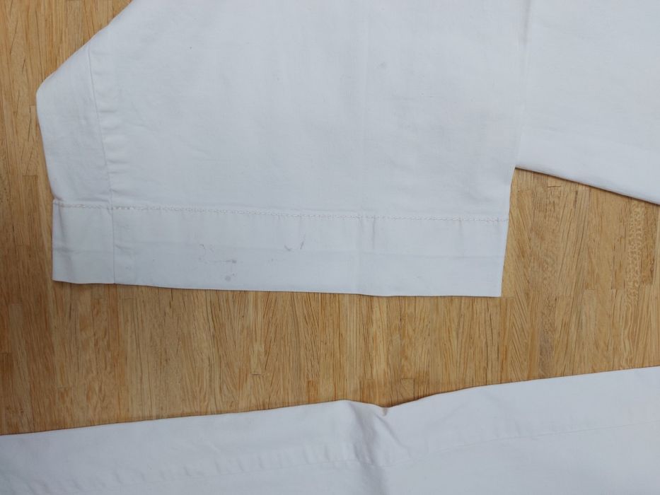 Lekkie białe spodnie rozm. 42