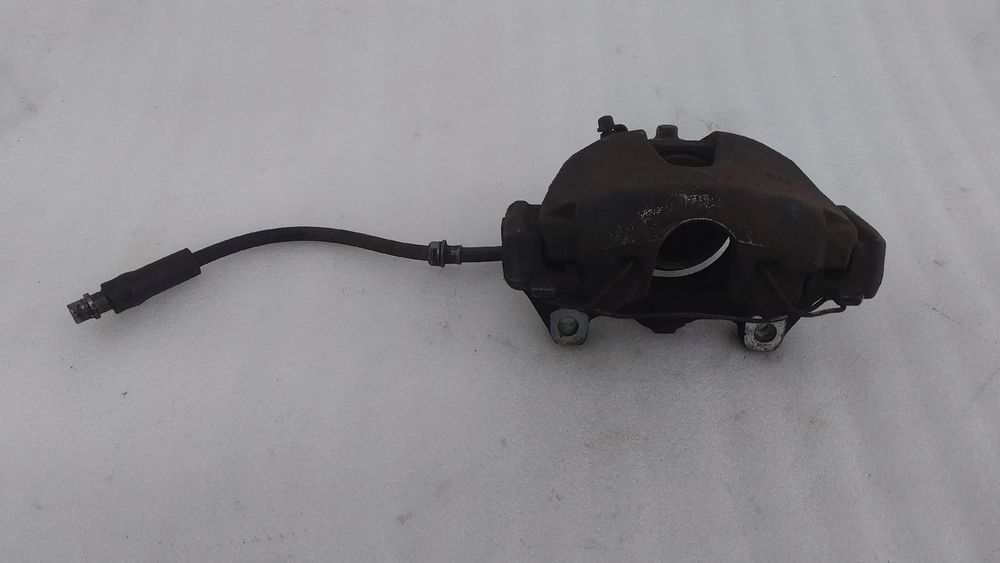 Pinça travão / maxila de travão frente direita OPEL Astra H Caravan (L