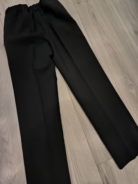 Materiałowe spodnie eleganckie dla chłopca rozmiar 140/146