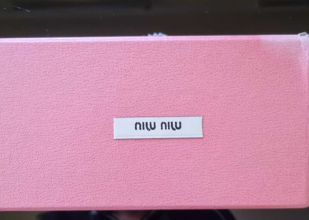 Окуляри Miu Miu білі