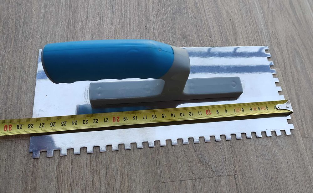 Гладилка з нержавіючої сталі 120x280 мм .