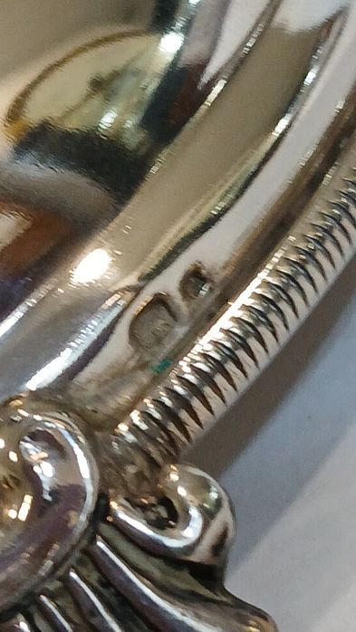 Par de castiçais em prata constratada