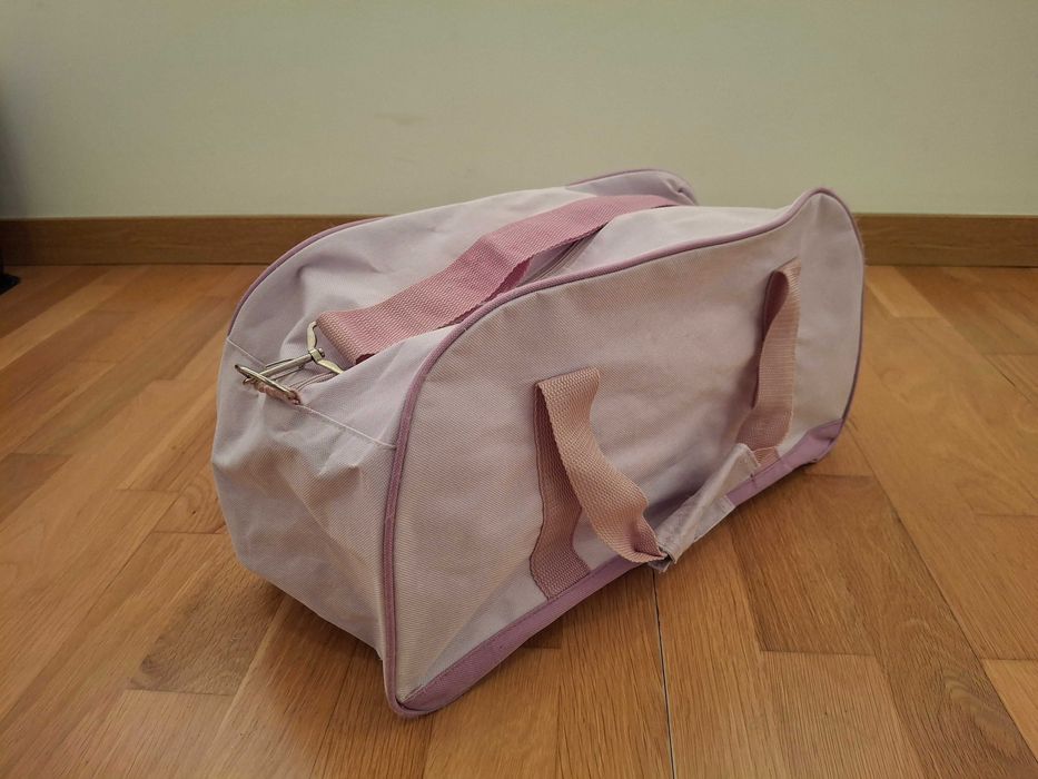Mala de viagem ou desporto rosa da Sininho