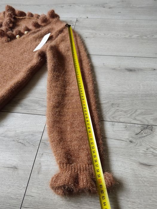 Puszysty włoski sweter damski.