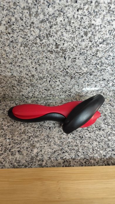 Abre latas tupperware