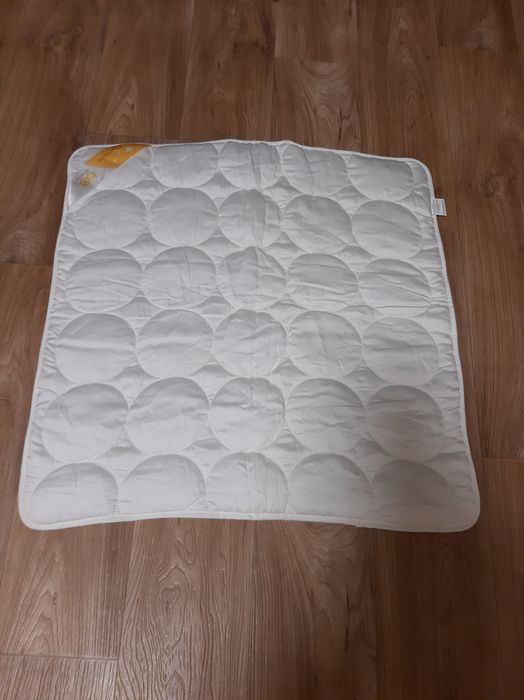 Kołderką prawie nowa