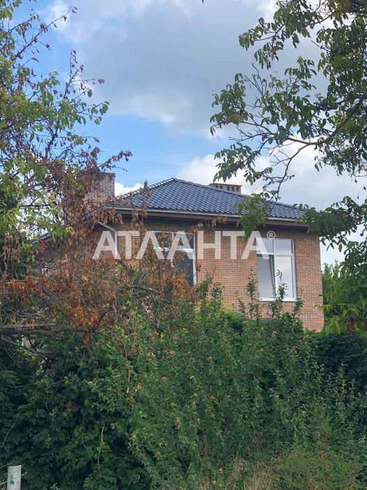 Добротный дом красный кирпич на Таирова
