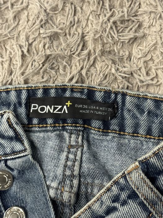 Джинси кокеткою кльош з розрізами