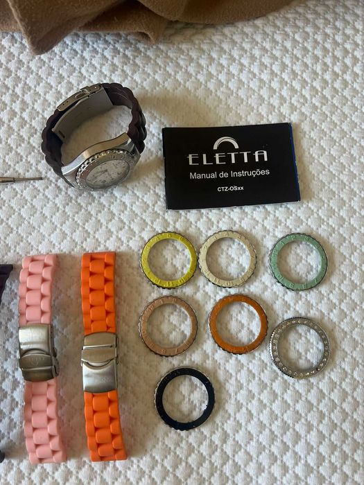 Relógio Electa em excelente estado,com várias braceletes e acessórios.
