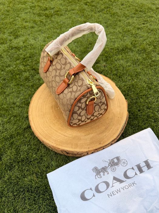 Mala Coach castanha