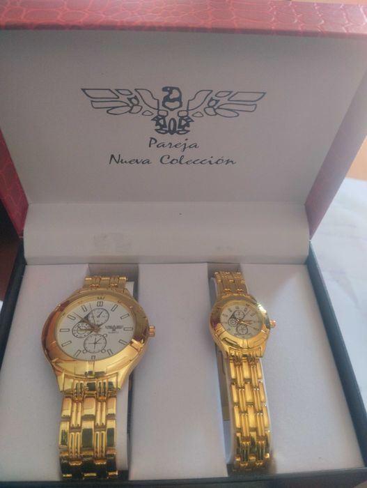 Pareja relógios glamour