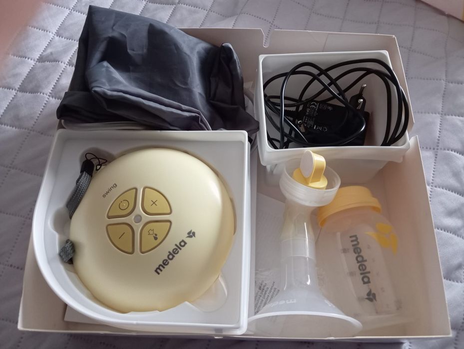 Medela swing extrator de leite + 2 frascos de leite