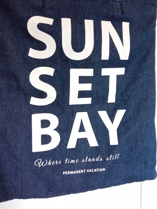 Jeansowa torebka z napisem CARRY