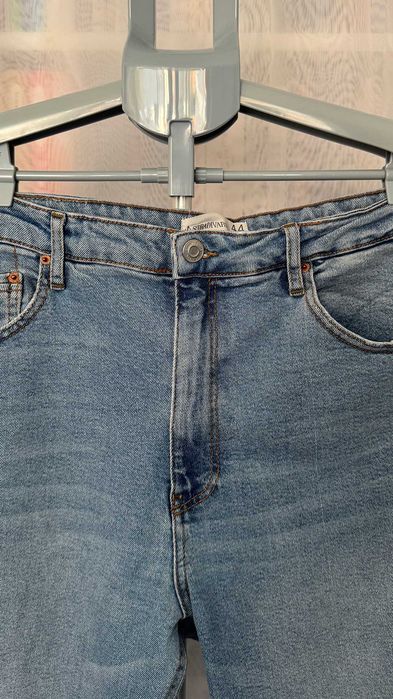 Jeansowe spodnie dzwony Stradivarius 44