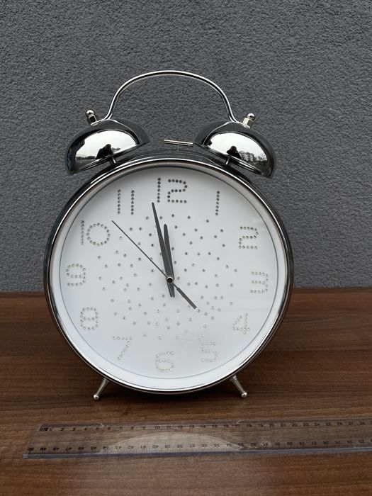 Duzy srebrny zegar nowy