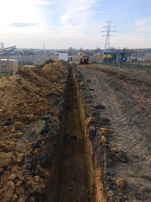 Koparko-ładowarka Usługi niwelacja terenu korytowanie wykopy przyłącza