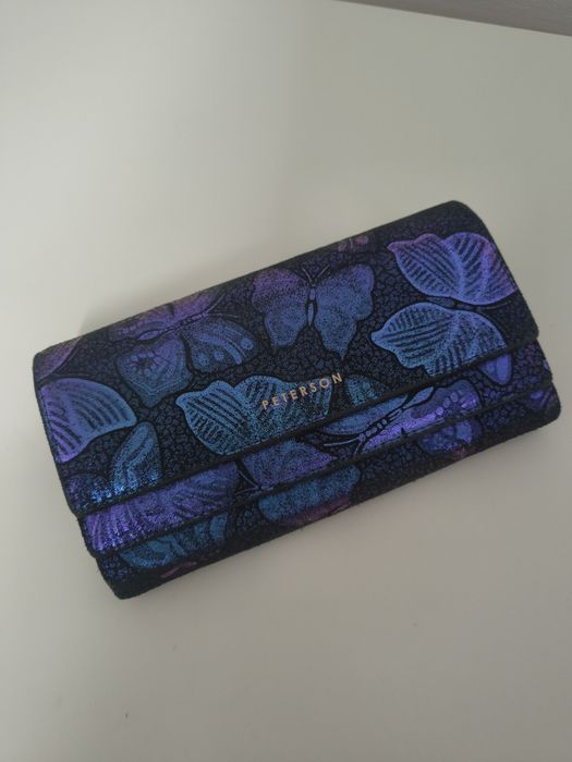 Piękny granatowy portfel Peterson w motyle uszkodzony