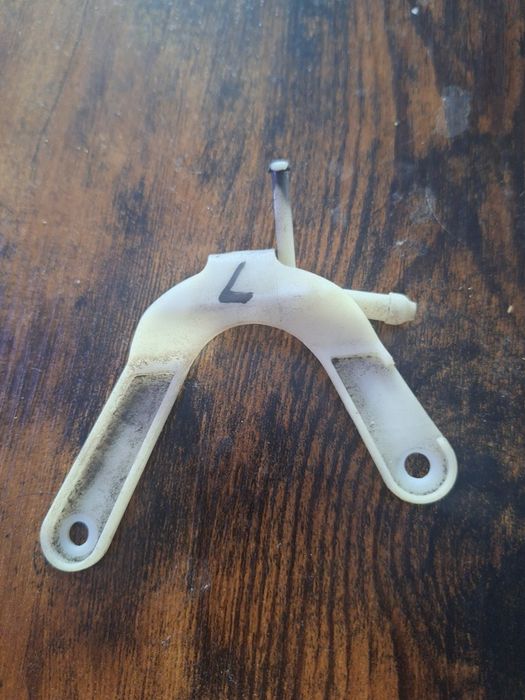 Łącznik kolanka spryskiwacz lampy Mercedes r129 lewy