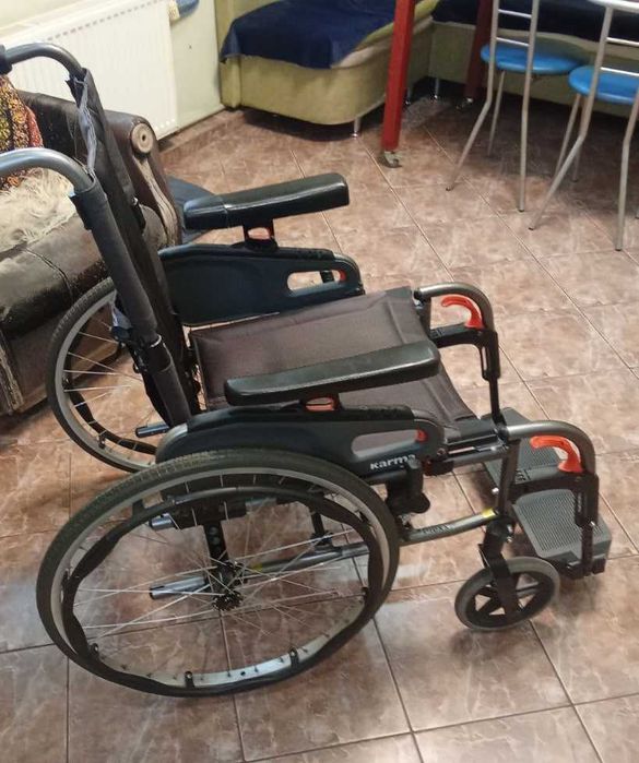 Инвалидная коляска