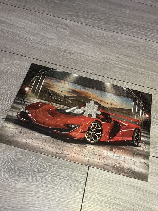 3 sztuki puzzli z autami (jedne zafoliowane,2 używane) 2x180 i 1x60 e.